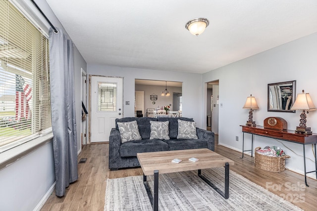 2210 Joes Lake Rd, Shelby, NC 28152 - living room featuring light wood-type flooring and baseboards