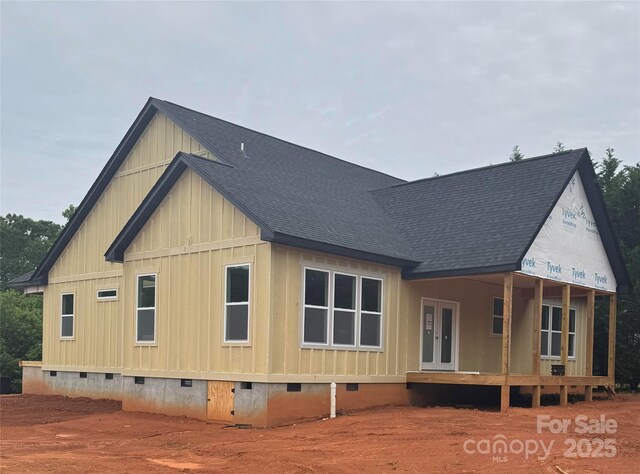 2589 Polo Ln, Maiden, NC 28650 - rear view of house with crawl space, a shingled roof, and board and batten siding