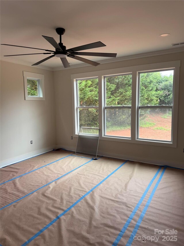 2589 Polo Ln, Maiden, NC 28650 - spare room featuring baseboards, a ceiling fan, and crown molding