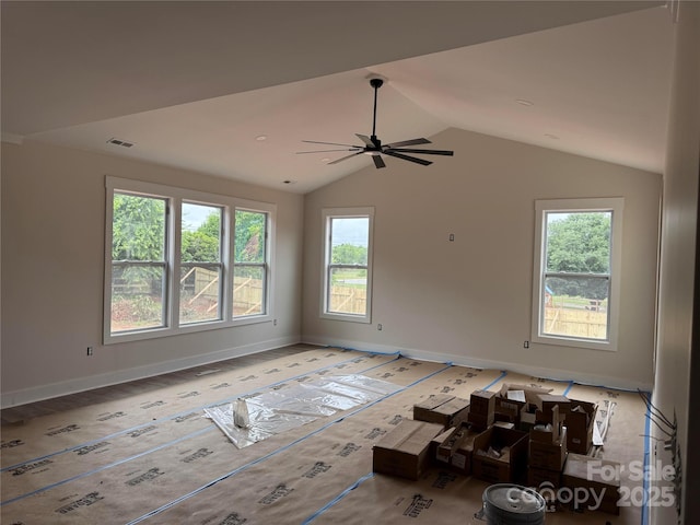2589 Polo Ln, Maiden, NC 28650 - spare room with healthy amount of natural light, lofted ceiling, a ceiling fan, and baseboards