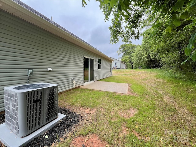212 Queens Ct, Gastonia, NC 28052 - view of green lawn featuring cooling unit and a patio area