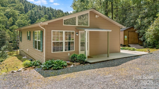 2763 Crabtree Rd, Spruce Pine, NC 28777 - view of shed featuring a forest view