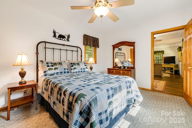 2763 Crabtree Rd, Spruce Pine, NC 28777 - carpeted bedroom with baseboards and a ceiling fan
