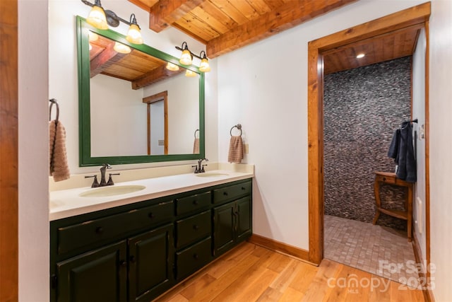 2709 Blythe Rd, Waxhaw, NC 28173 - bathroom featuring wood ceiling with exposed beams, wood finished floors, and double vanity