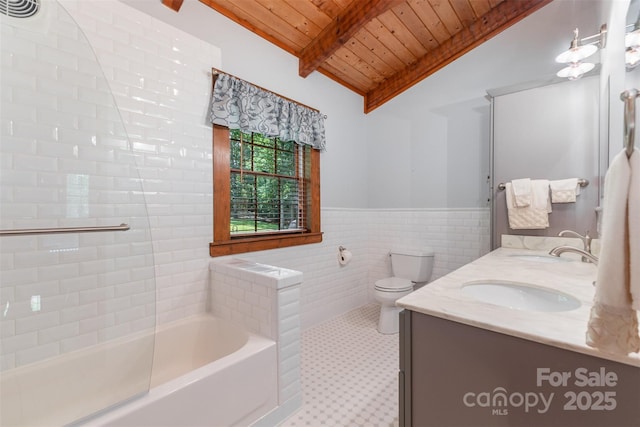 2709 Blythe Rd, Waxhaw, NC 28173 - bathroom with wood ceiling, a wainscoted wall, double vanity, tile walls, and toilet