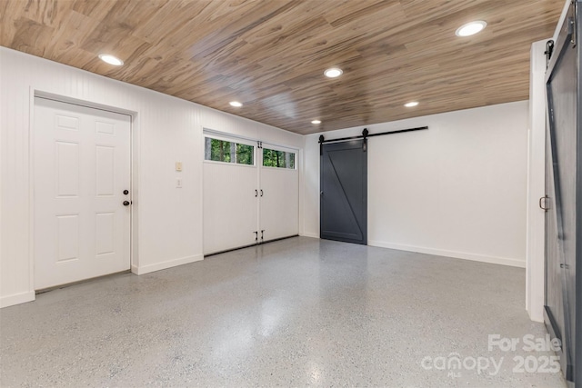 2709 Blythe Rd, Waxhaw, NC 28173 - garage featuring wooden ceiling, baseboards, and recessed lighting