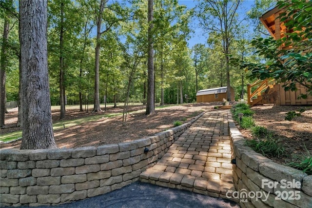 2709 Blythe Rd, Waxhaw, NC 28173 - view of patio / terrace with an outbuilding and stairs