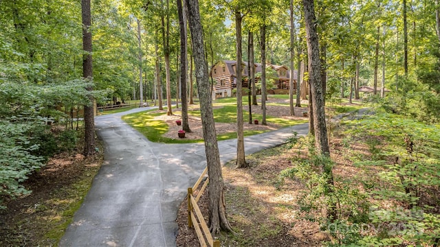 2709 Blythe Rd, Waxhaw, NC 28173 - view of concrete surface featuring a forest view