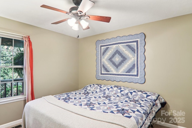 123 Brandymill Loop, Etowah, NC 28729 - bedroom featuring baseboards and a ceiling fan