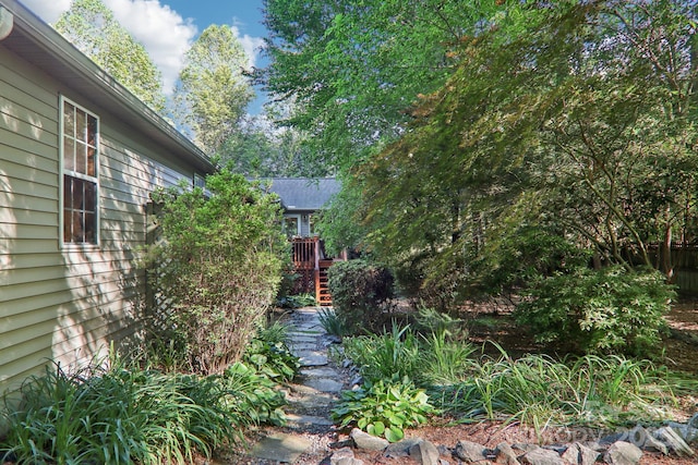 123 Brandymill Loop, Etowah, NC 28729 - view of yard with stairway and a wooden deck