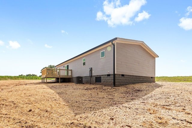 977 Myers Mill Rd, Olin, NC 28660 - view of home's exterior with crawl space and a wooden deck