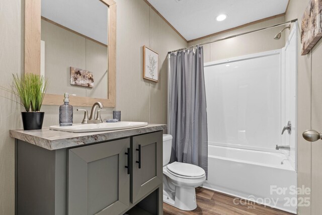 977 Myers Mill Rd, Olin, NC 28660 - full bathroom with vanity, wood finished floors, and shower / tub combo