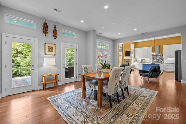 2009 Waterbury Ln, Waxhaw, NC 28173 - dining area with plenty of natural light, recessed lighting, and light wood-style floors
