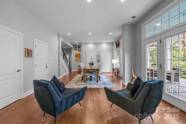 2009 Waterbury Ln, Waxhaw, NC 28173 - living area with stairway, wood finished floors, and recessed lighting