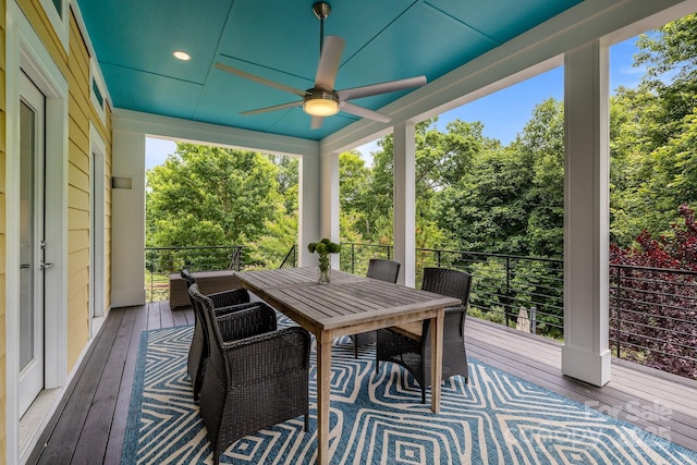 2009 Waterbury Ln, Waxhaw, NC 28173 - sunroom with a ceiling fan and view of scattered trees
