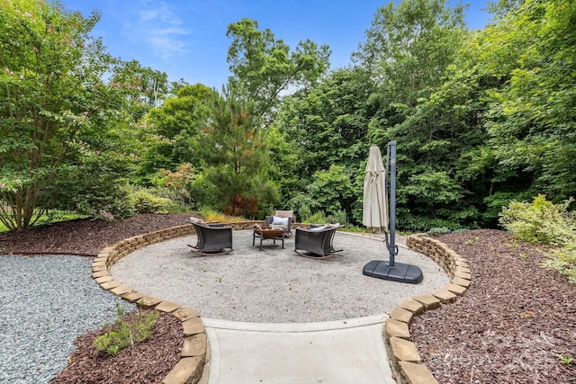 2009 Waterbury Ln, Waxhaw, NC 28173 - view of patio with an outdoor fire pit