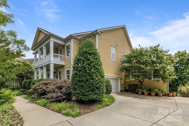 2009 Waterbury Ln, Waxhaw, NC 28173 - view of property exterior with concrete driveway and an attached garage
