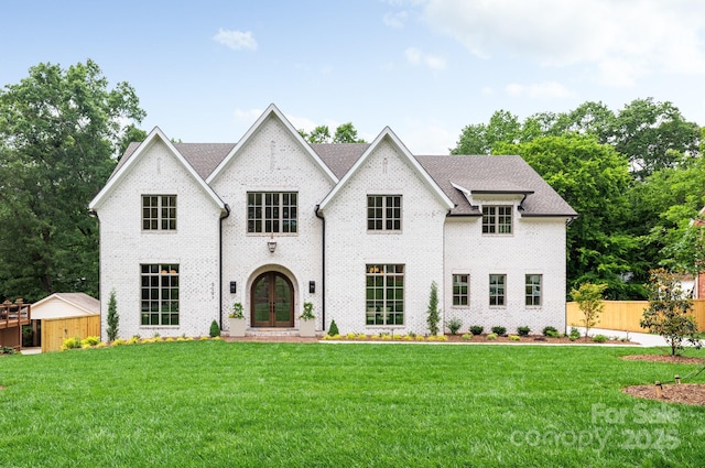 5127 Lansing Dr, Charlotte, NC 28270 - french country style house with french doors and brick siding