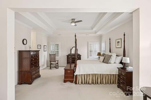11103 Fountaingrove Dr, Charlotte, NC 28262 - bedroom featuring ornamental molding, multiple windows, light colored carpet, and a tray ceiling