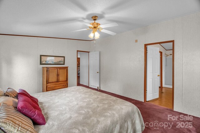 7232 Executive Cir, Denver, NC 28037 - carpeted bedroom featuring a ceiling fan