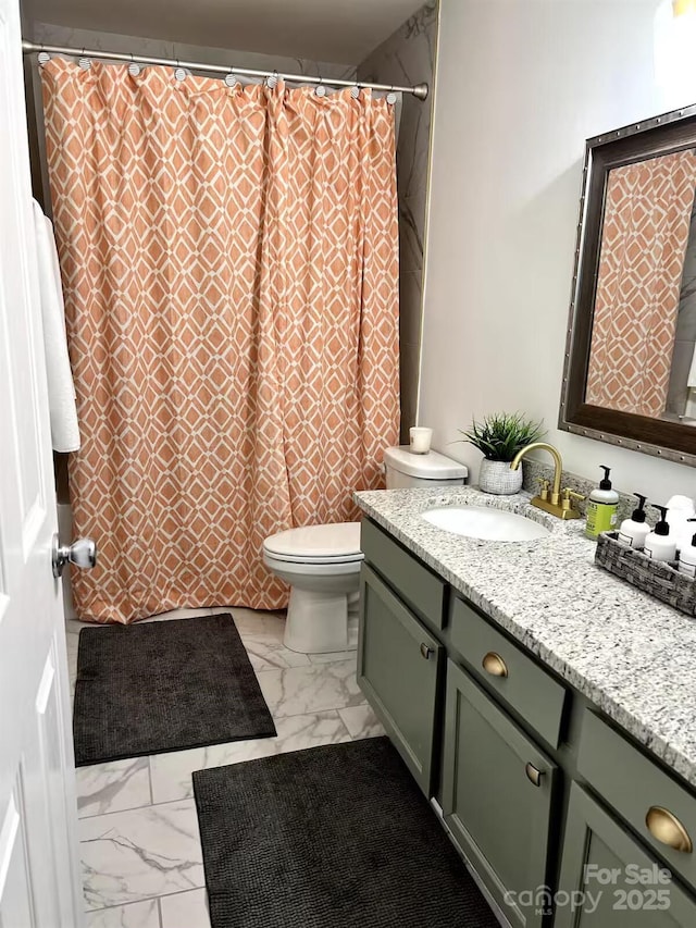 229 Windsor Point Rd Unit 6D, Columbia, SC 29223 - full bath featuring marble look tiles, vanity, toilet, and a shower with shower curtain