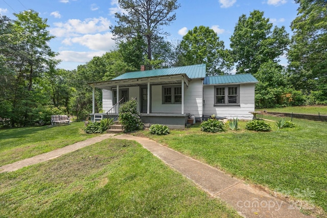 6 Willies Hl, Fletcher, NC 28732 - bungalow-style home featuring covered porch, a front lawn, and metal roof