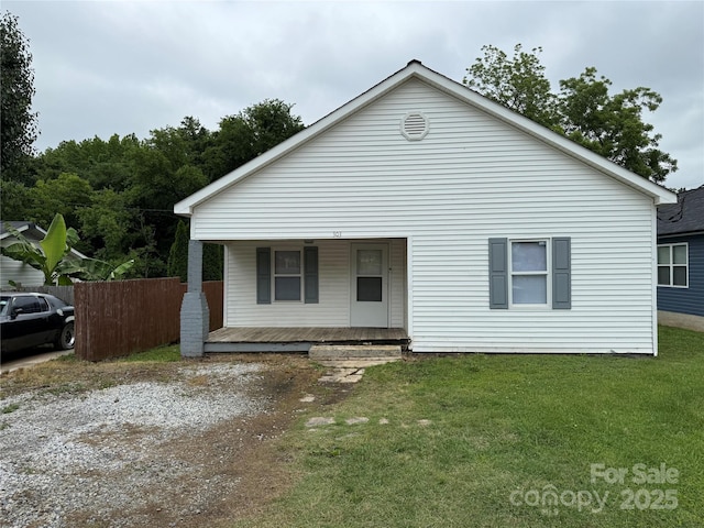 303 Southern Ave, East Spencer, NC 28039 - bungalow-style house featuring covered porch and a front yard