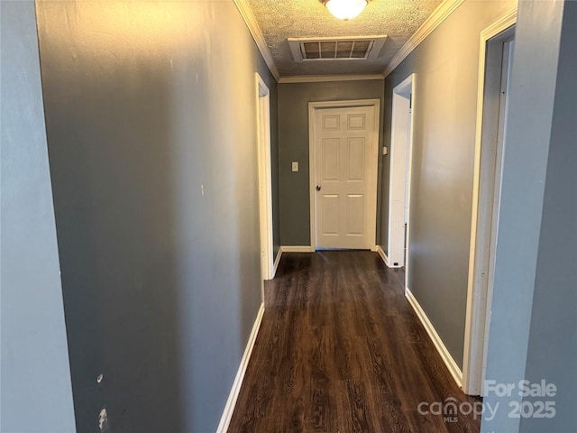 303 Southern Ave, East Spencer, NC 28039 - corridor featuring crown molding, dark wood-style floors, and baseboards