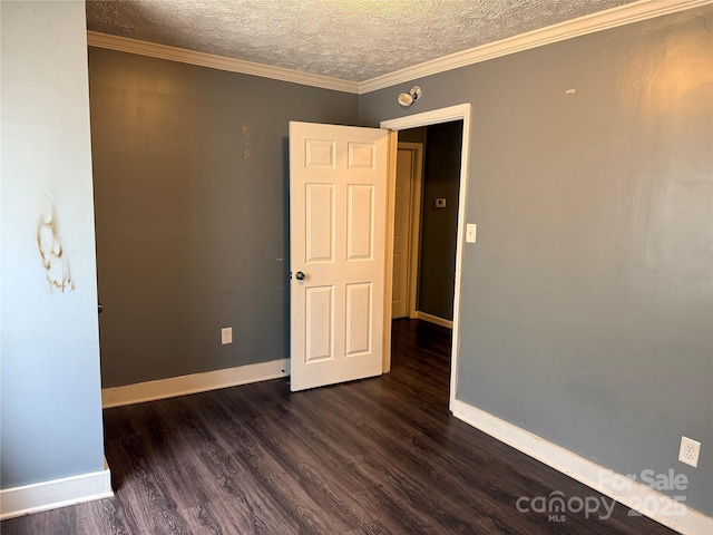 303 Southern Ave, East Spencer, NC 28039 - empty room with dark wood-type flooring, baseboards, and a textured ceiling