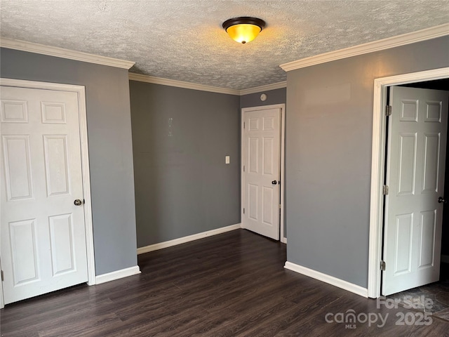 303 Southern Ave, East Spencer, NC 28039 - unfurnished room with dark wood-style floors, baseboards, and a textured ceiling