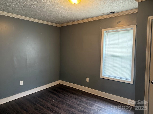 303 Southern Ave, East Spencer, NC 28039 - empty room with dark wood finished floors, baseboards, a textured ceiling, and crown molding