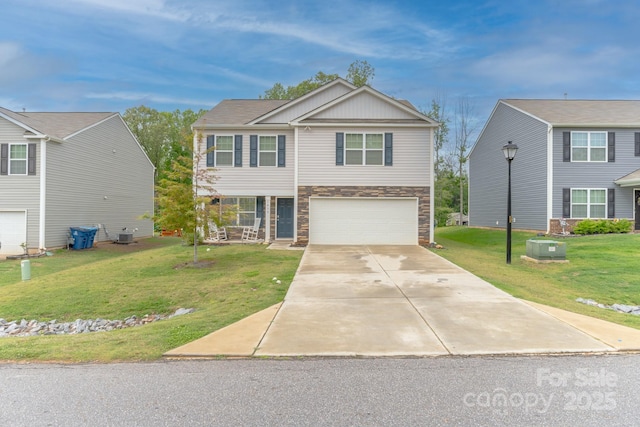 2859 Sherrills Stream Dr, Sherrills Ford, NC 28673 - view of front of home with a garage, stone siding, concrete driveway, and a front yard