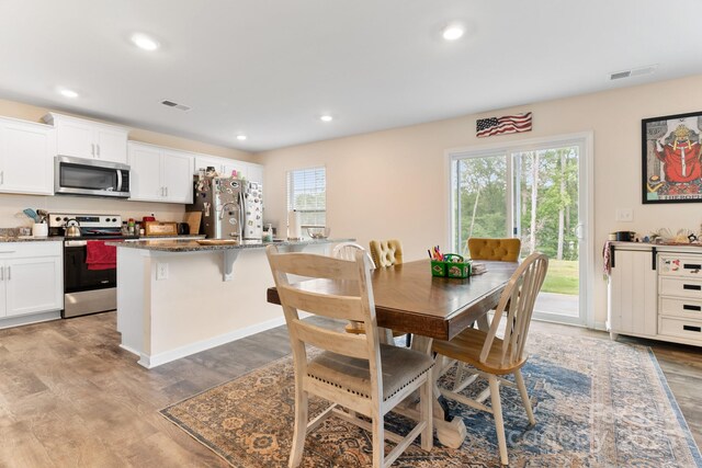2859 Sherrills Stream Dr, Sherrills Ford, NC 28673 - dining space with light wood-style flooring and recessed lighting