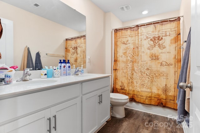 2859 Sherrills Stream Dr, Sherrills Ford, NC 28673 - bathroom with toilet, wood finished floors, and double vanity