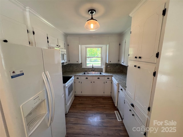 8095 New St, Mount Pleasant, NC 28124 - kitchen with white appliances, a sink, dark wood-style flooring, white cabinets, and crown molding