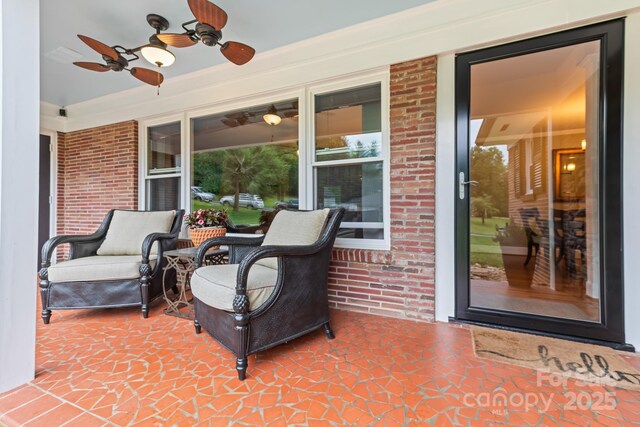 306 Tremont Park Cir SE, Lenoir, NC 28645 - porch featuring a ceiling fan