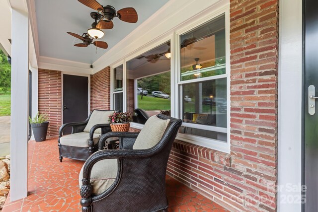 306 Tremont Park Cir SE, Lenoir, NC 28645 - covered porch featuring ceiling fan