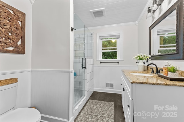 306 Tremont Park Cir SE, Lenoir, NC 28645 - full bath with vanity, toilet, a stall shower, and crown molding