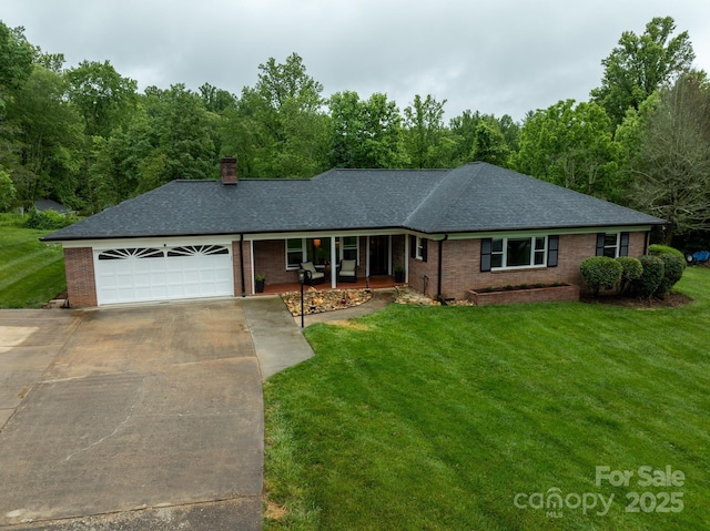306 Tremont Park Cir SE, Lenoir, NC 28645 - ranch-style home featuring concrete driveway, a garage, a front lawn, brick siding, and a shingled roof