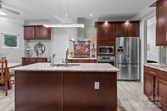 1525 Valhalla Dr, Denver, NC 28037 - kitchen featuring stainless steel appliances, crown molding, a sink, light wood-style floors, and wall chimney exhaust hood