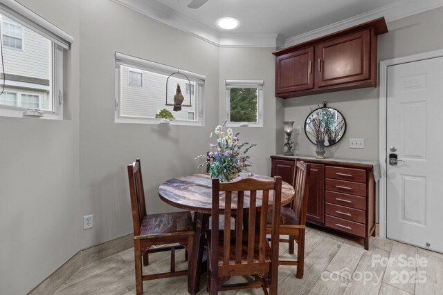 1525 Valhalla Dr, Denver, NC 28037 - dining area featuring light wood-style floors and crown molding