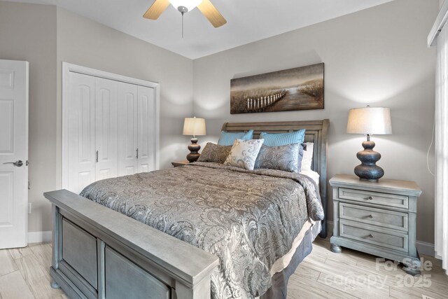 1525 Valhalla Dr, Denver, NC 28037 - bedroom featuring a closet, baseboards, light wood-type flooring, and a ceiling fan