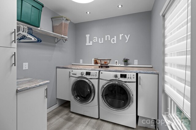 1525 Valhalla Dr, Denver, NC 28037 - laundry room featuring light wood-style floors, separate washer and dryer, cabinet space, and recessed lighting