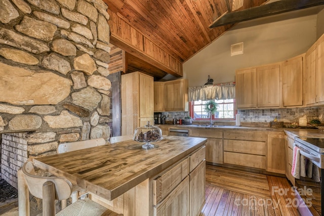 164 Avery County High School Rd, Newland, NC 28657 - kitchen with butcher block counters, wood ceiling with exposed beams, light brown cabinetry, high vaulted ceiling, and tasteful backsplash