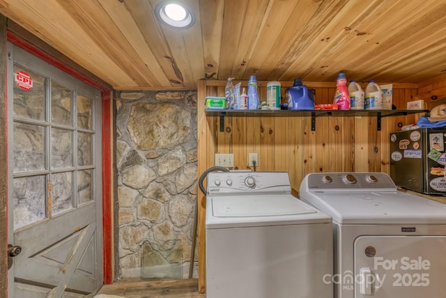 164 Avery County High School Rd, Newland, NC 28657 - washroom with washing machine and clothes dryer, wood ceiling, and wood walls