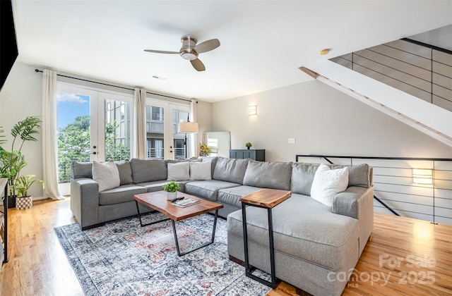 925 Westbrook Dr Unit B, Charlotte, NC 28202 - living area featuring wood finished floors, a ceiling fan, and french doors