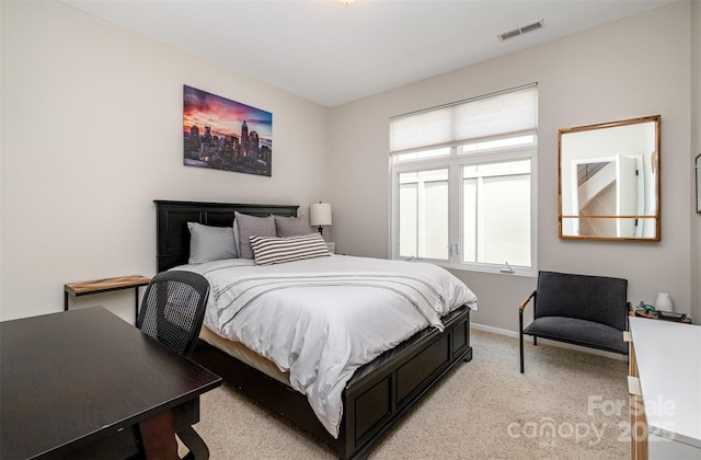 925 Westbrook Dr Unit B, Charlotte, NC 28202 - bedroom featuring light carpet and baseboards