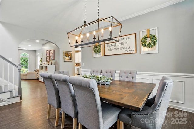 147 Whitley Mills Rd, Fort Mill, SC 29708 - dining area with arched walkways, stairway, dark wood finished floors, wainscoting, and ornamental molding