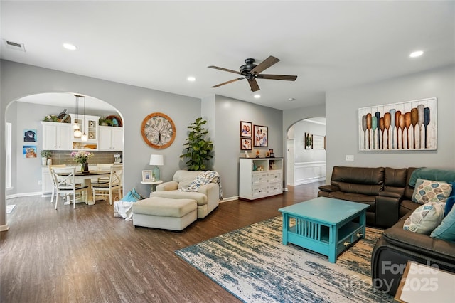 147 Whitley Mills Rd, Fort Mill, SC 29708 - living room featuring arched walkways, ceiling fan, dark wood-type flooring, recessed lighting, and baseboards