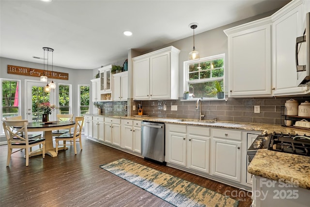 147 Whitley Mills Rd, Fort Mill, SC 29708 - kitchen with stainless steel dishwasher, a sink, white cabinetry, backsplash, and dark wood-style floors